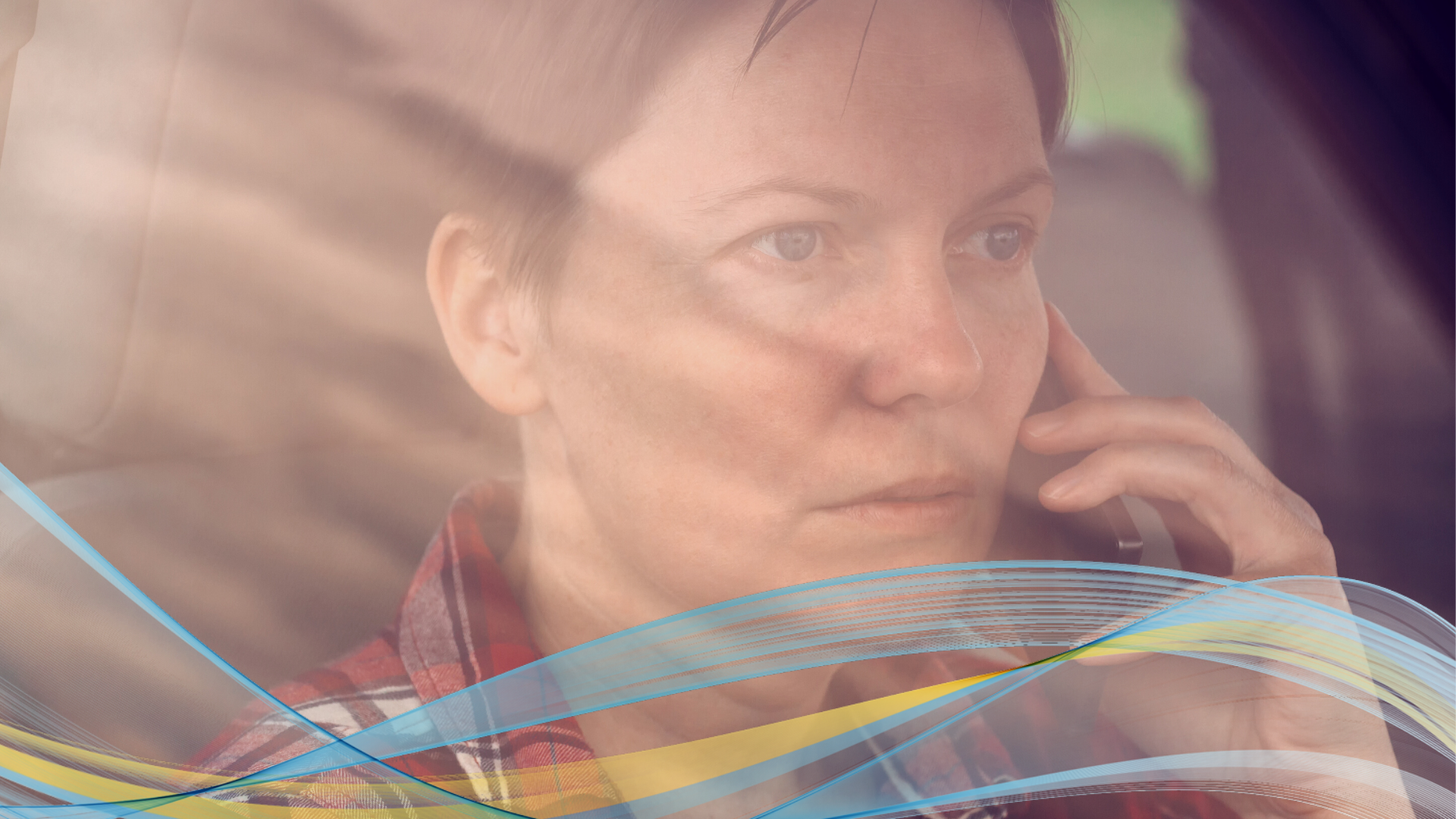 iStock image of women sitting in car on mobile phone