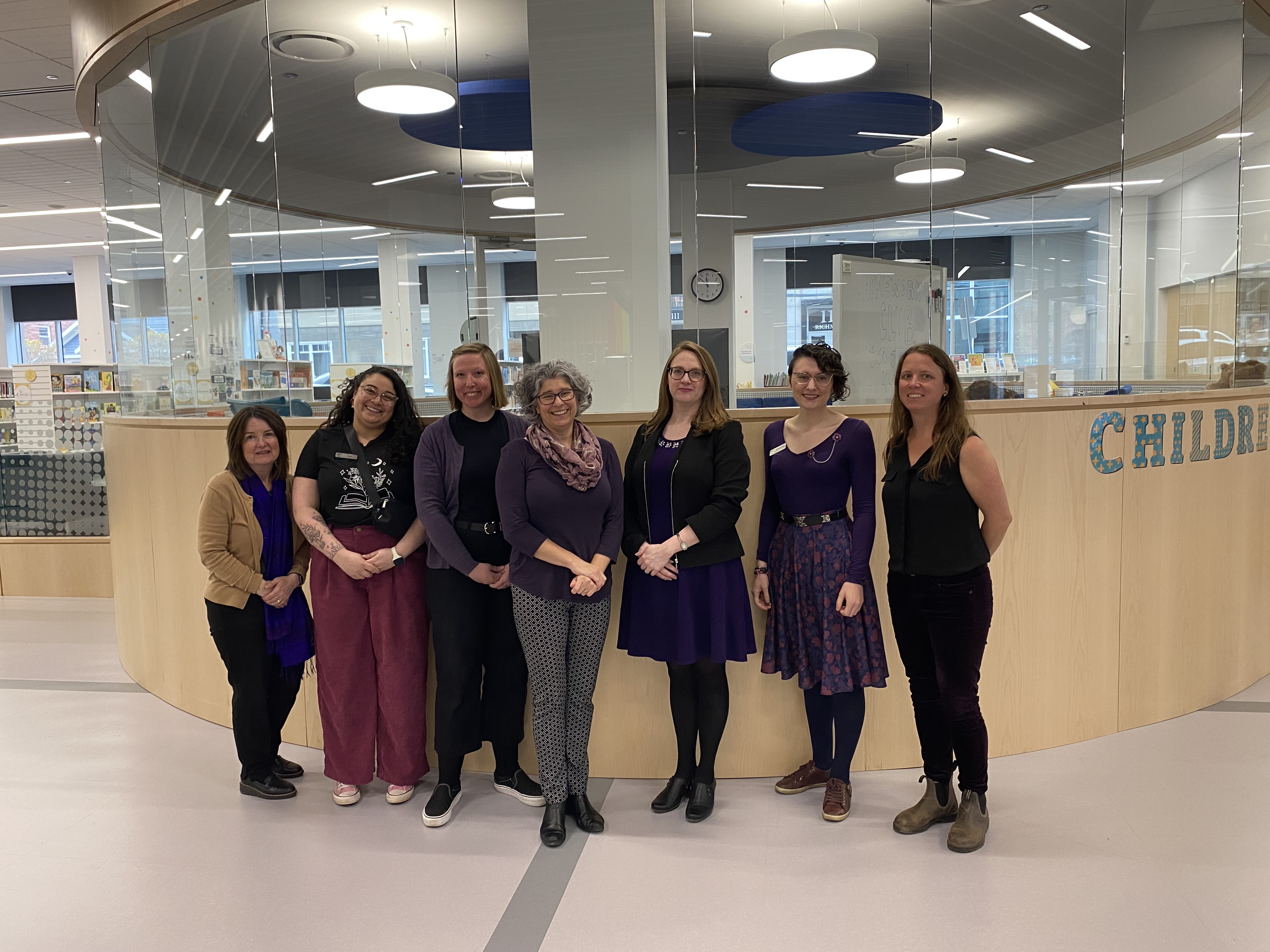 Department of Education and Early Years employees wearing purple in support of Family Violence Prevention Week 2023
